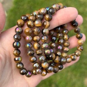 Aura coated tigers eye 8mm - listing price is PER bracelet